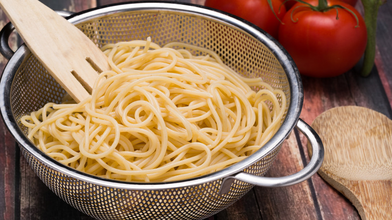 Spaghetti in strainer