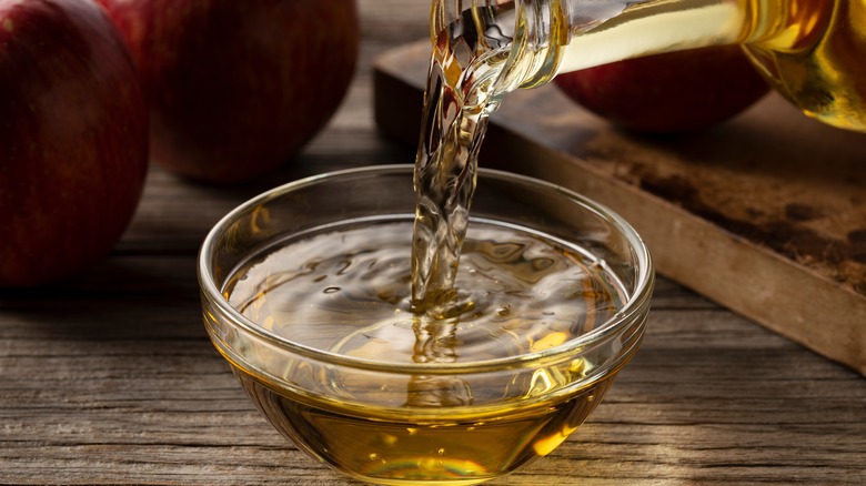 apple cider vinegar poured into a bowl