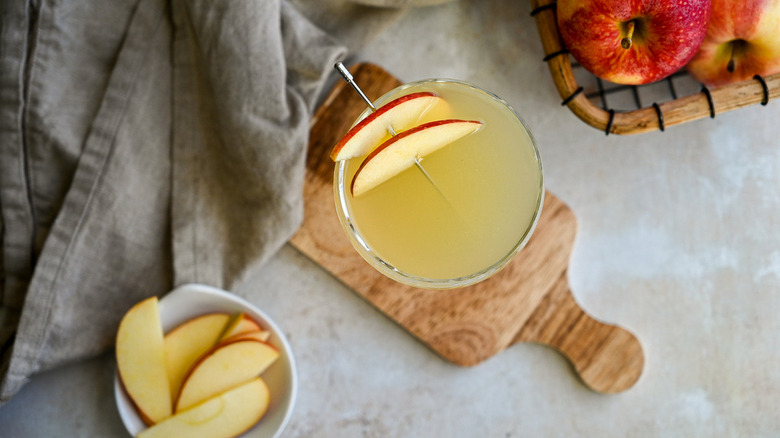 apple martini on wooden board