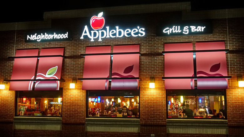 Customers inside Applebee's at night