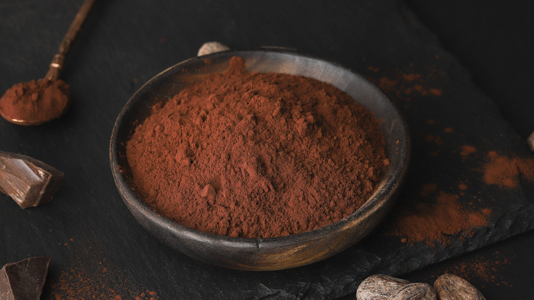 Bowl of dark cocoa powder