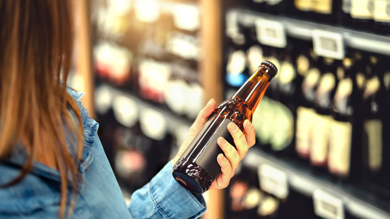 Woman buying beer