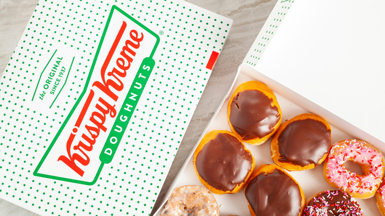 boxes of Krispy Kreme frosted doughnuts