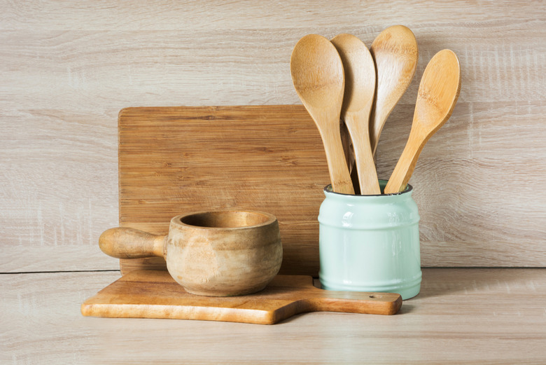 What are the pros and cons of wooden cooking utensils?