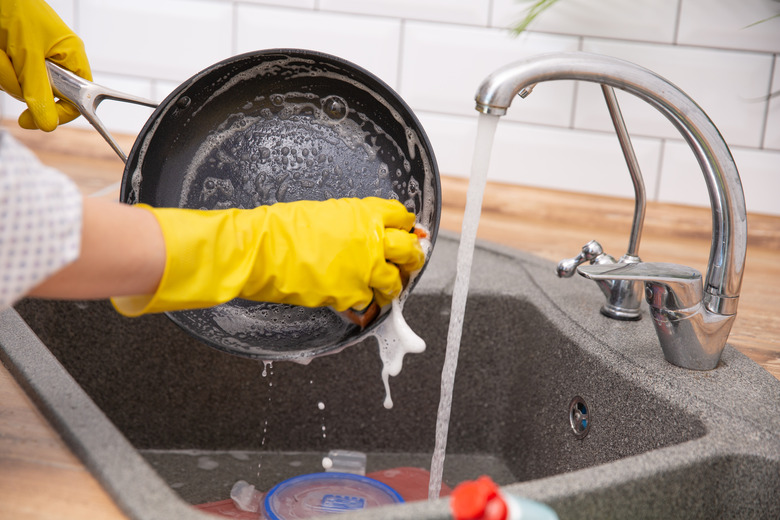 Can you wash a pan as soon as it comes off the burner?