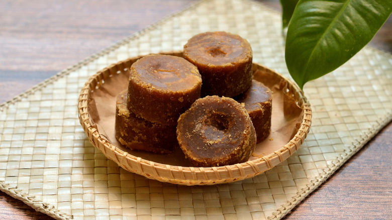 Jaggery blocks palm sugar on plate