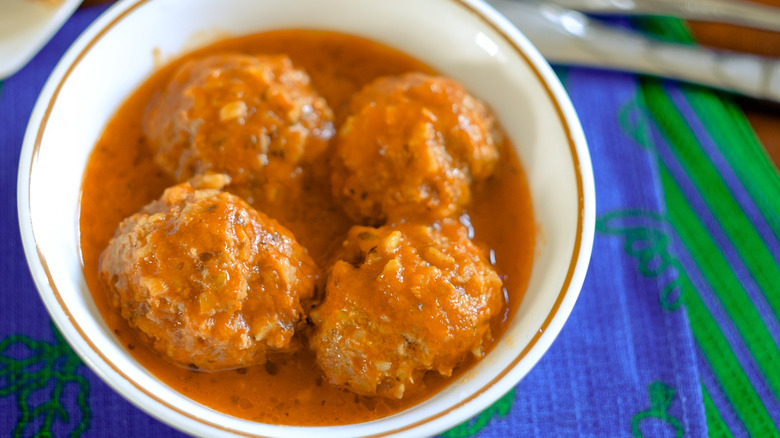 Porcupine meatballs in tomato sauce in a bowl