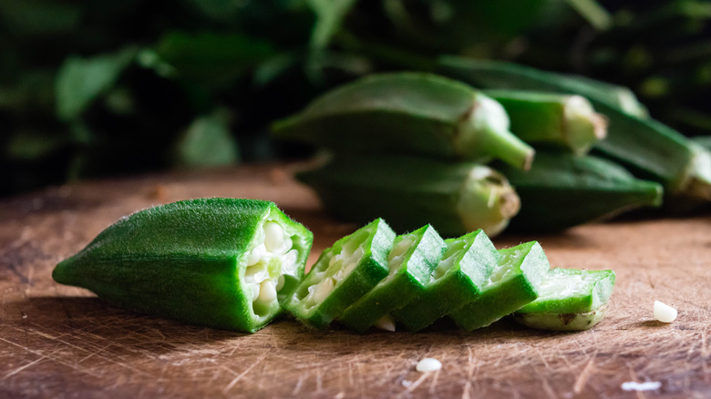 An okra pod sliced into rounds