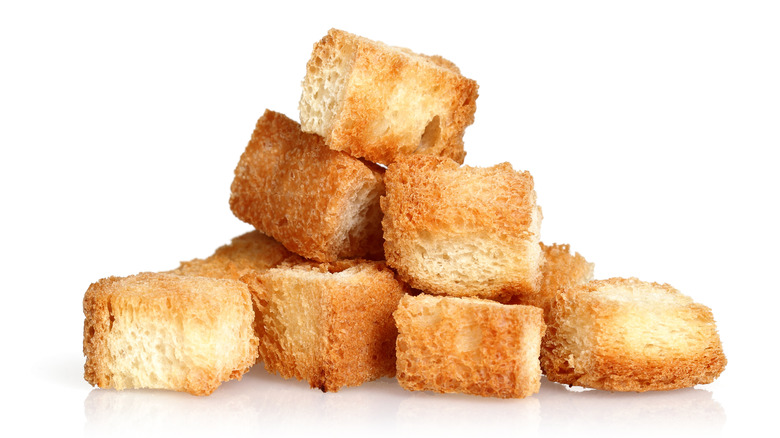 a stack of white bread croutons