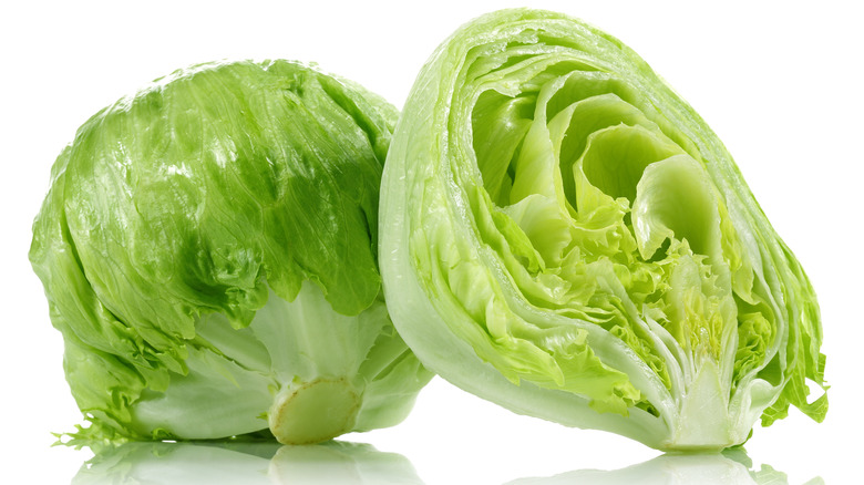 Iceberg lettuce head chopped in half