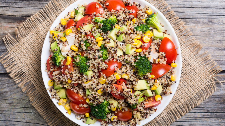 Salad topped with quinoa