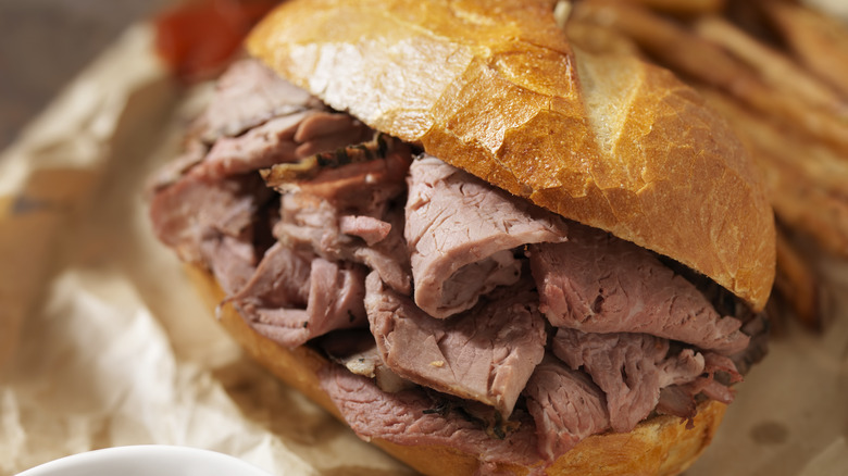 french dip sandwich filled with roast beef