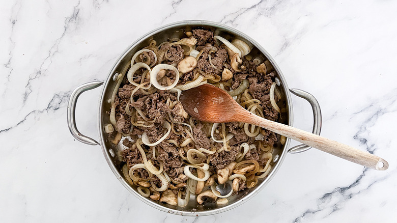 beef and veggies in skillet 