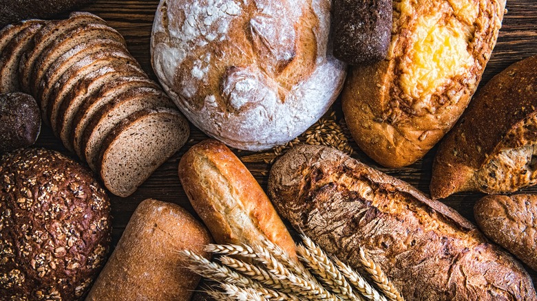 wheat bread on wood block