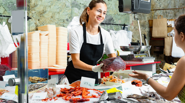 Fishmonger at work