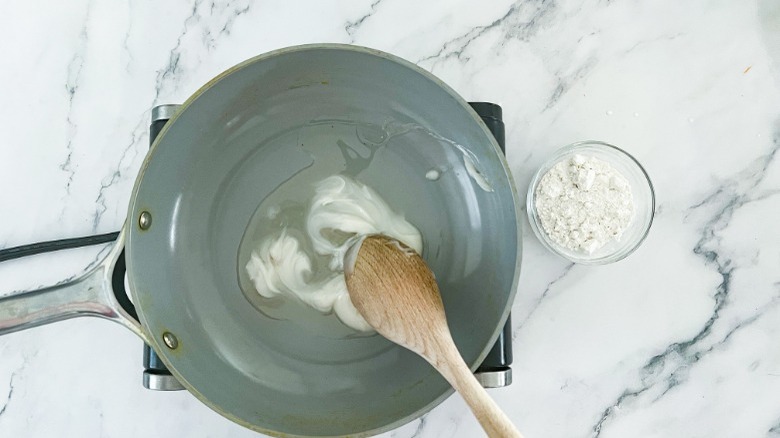 bacon grease melting in skillet