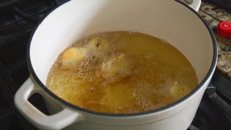 hush puppies frying in oil