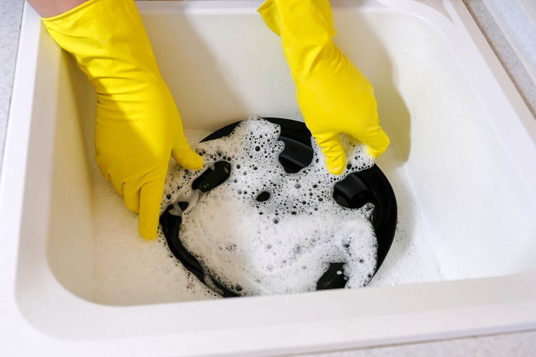 You wash your cast-iron skillet with soap