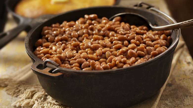 cast iron pot of baked beans 