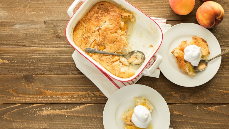 Peach cobbler with whipped cream