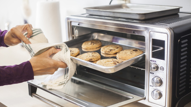 choc chip cookies baking in toaster oven