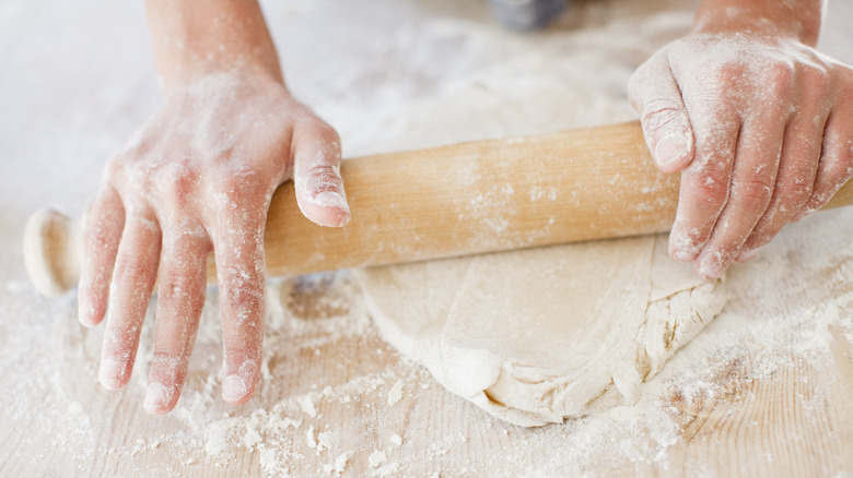 rolling pin covered in flour