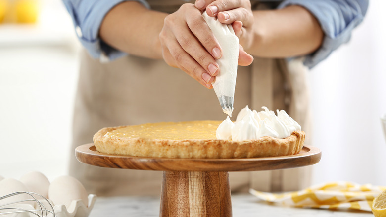 woman using piping bag