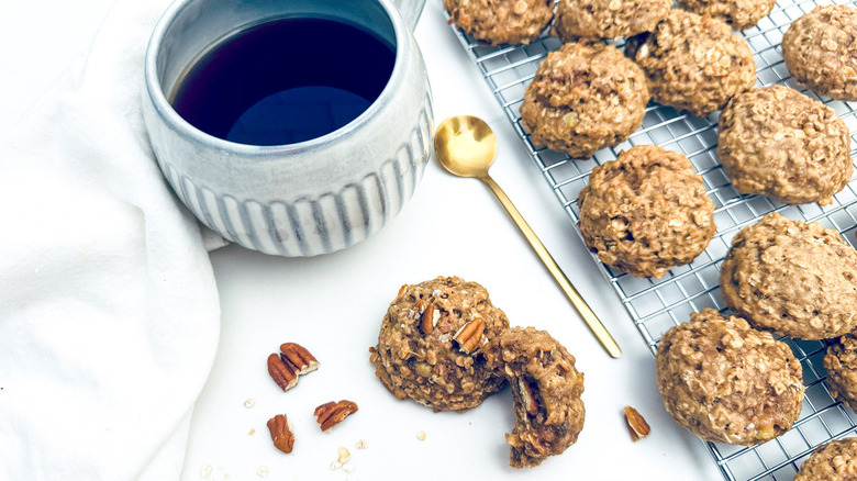 pecan cookies on cooling rack with coffee