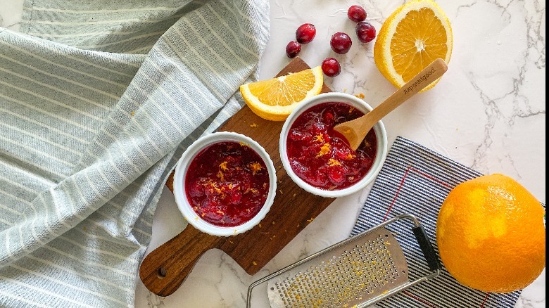 cranberries with orange zest in bowls