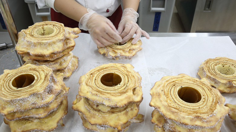 preparing baumkuchen for sale