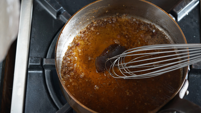 deglazing pan with whisk