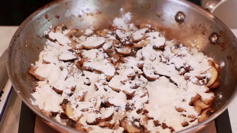 Adding flour to stew