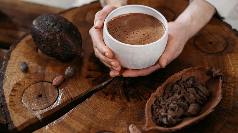 Cacao pod and hot chocolate