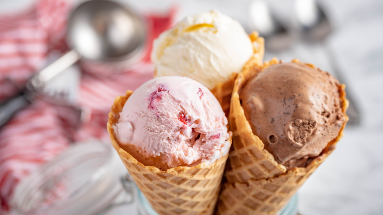 Chocolate, vanilla, and strawberry ice cream cones