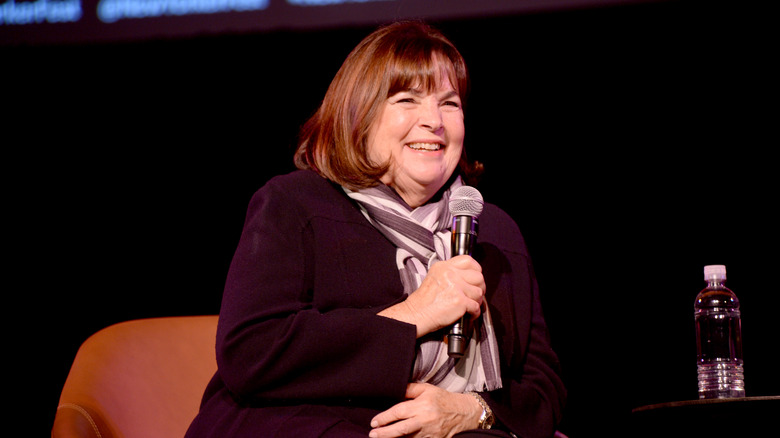 Ina Garten smiling with microphone