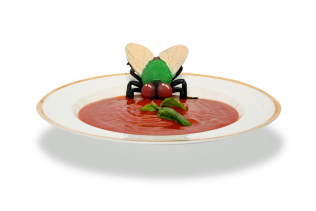 A man looks down at his soup bowl in a restaurant and sees a fly in it. "Waiter," he says, "what's this fly doing in my soup?" 