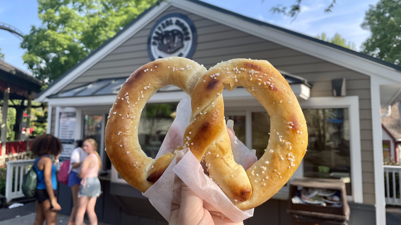 Soft pretzel with building behind