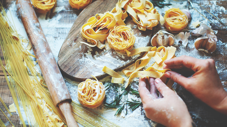 Person making fresh pasta