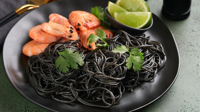 Squid ink pasta with prawns