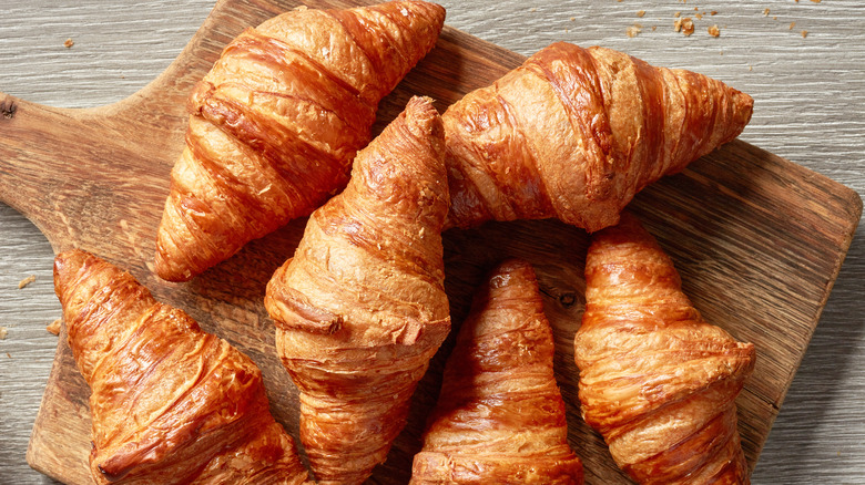 Croissants on cutting board