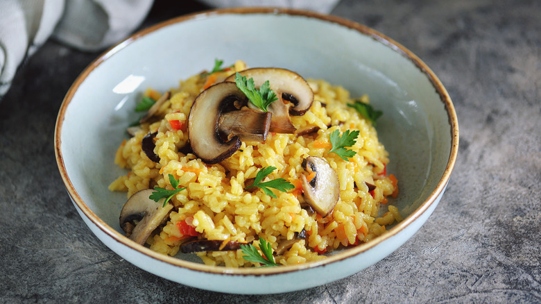 Paella with mushrooms on plate