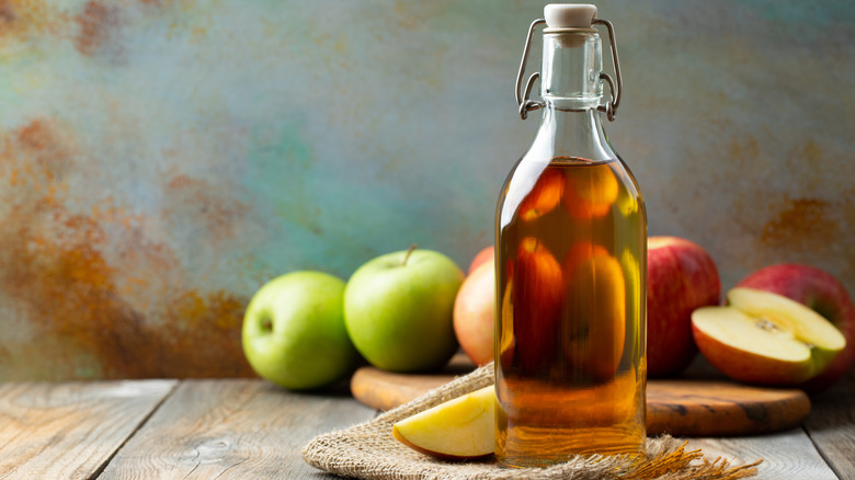 Bottled apple cider with whole apples