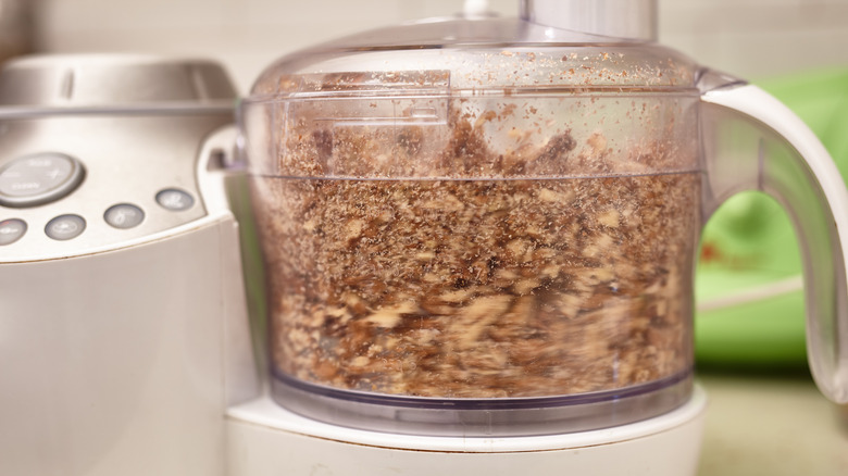 Walnuts in a food processor