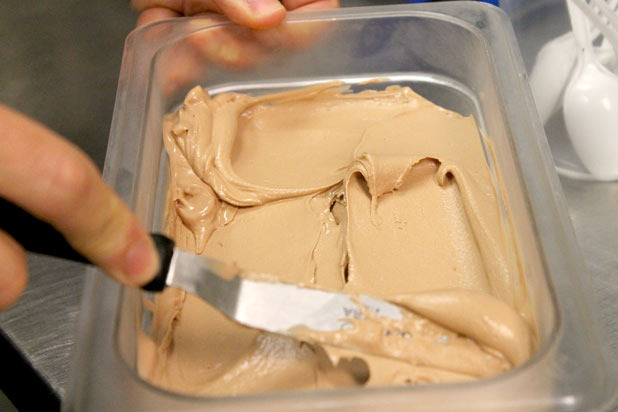 Putting the ice cream in plastic