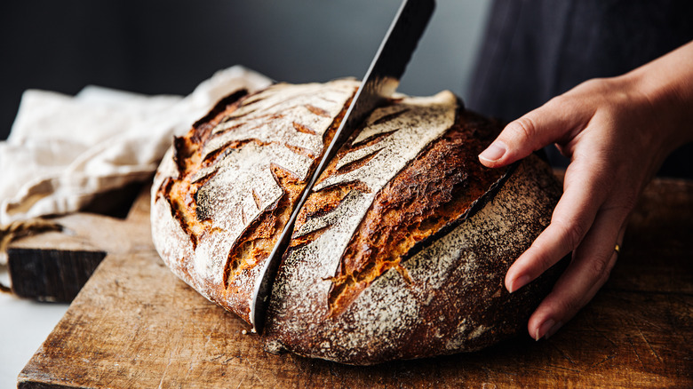 bread being sliced