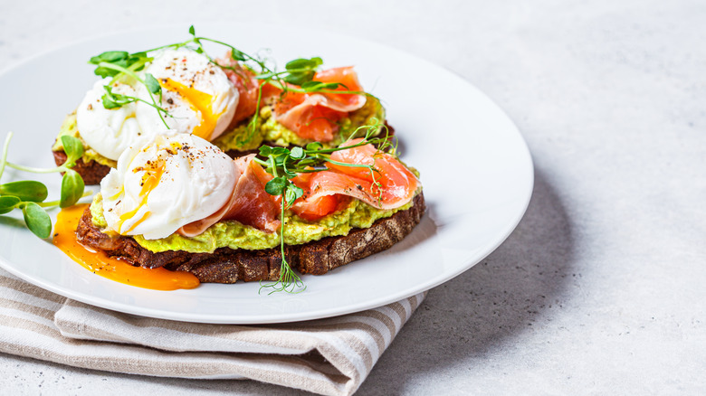 Avocado toast with salmon and poached eggs