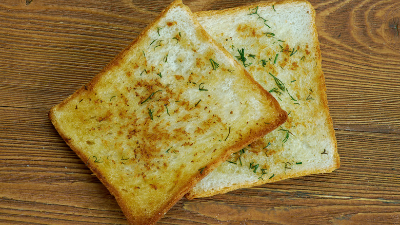 Thick toast with herbs and butter