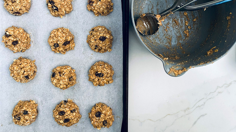 unbaked oatmeal cookies on pan