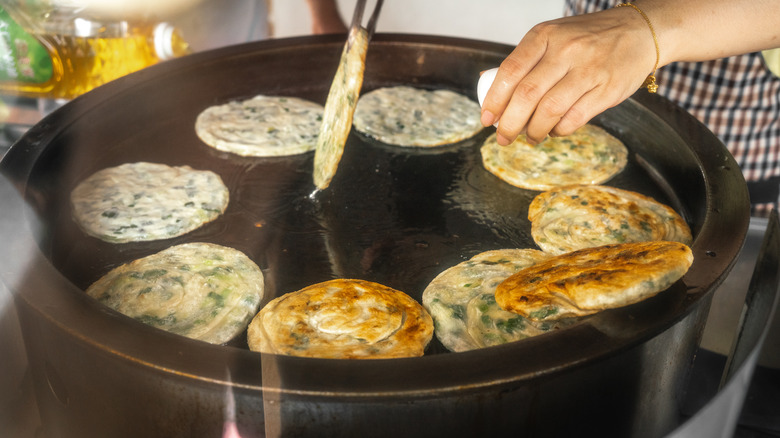 frying scallion pancakes