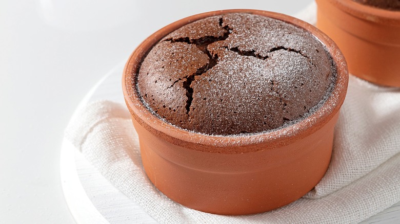 Chocolate soufflé in terracotta pot